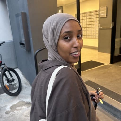 Illustrative AI-generated portrait for Aisha's review scenario